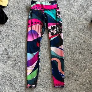 Pockets on both legs a zipper on the back and pocket in front